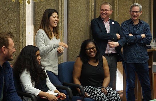 Department members laughing at a party